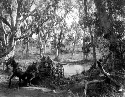 Crossing Salt Creek near the Roper River, Eastern Arnhem Land, Australia, July 1911 by Walter Baldwin Spencer